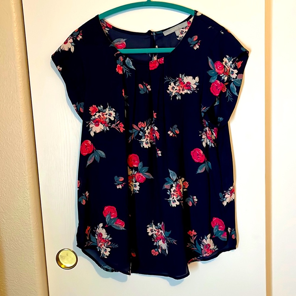 Large floral blue top